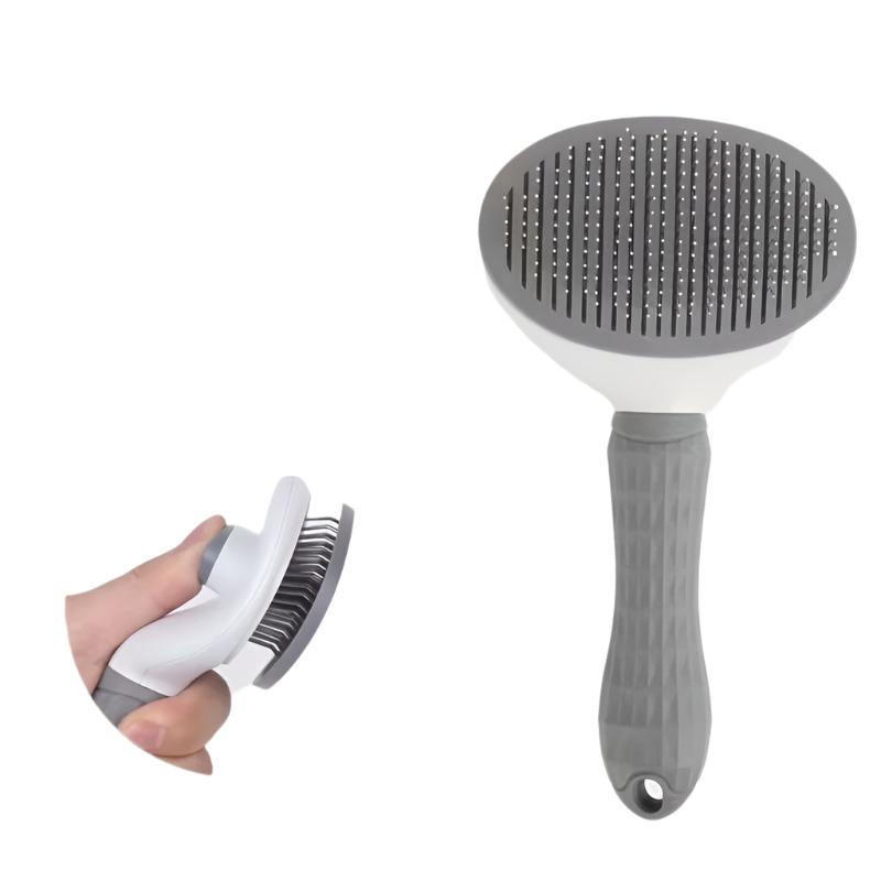 Graue Haustierbürste mit ergonomischem Griff, ideal für Fellpflege und Tierhaare entfernen.
