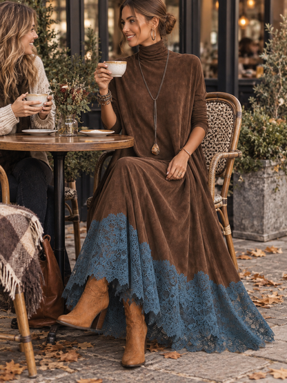Modell i den bruna klänningen sitter på ett kafé och dricker kaffe, höstlöv på marken 6