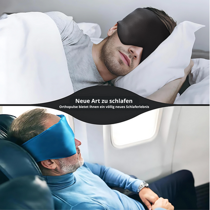 Mann mit schwarzer Schlafmaske im Flugzeug, Orthopulse Schlafhilfe, komfortabel reisen.