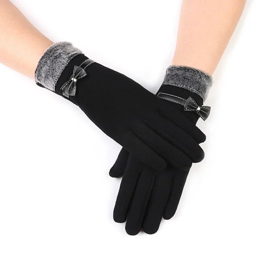 Schwarze Damenhandschuhe mit grauem Fellbesatz und Schleifen, Wintermode Accessoire.