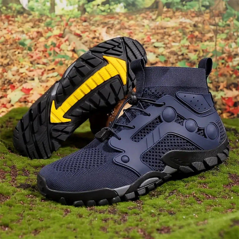 Dunkelblaue Wanderschuhe mit gelber Sohle, atmungsaktiv, rutschfest, ideal für Outdoor-Aktivitäten.