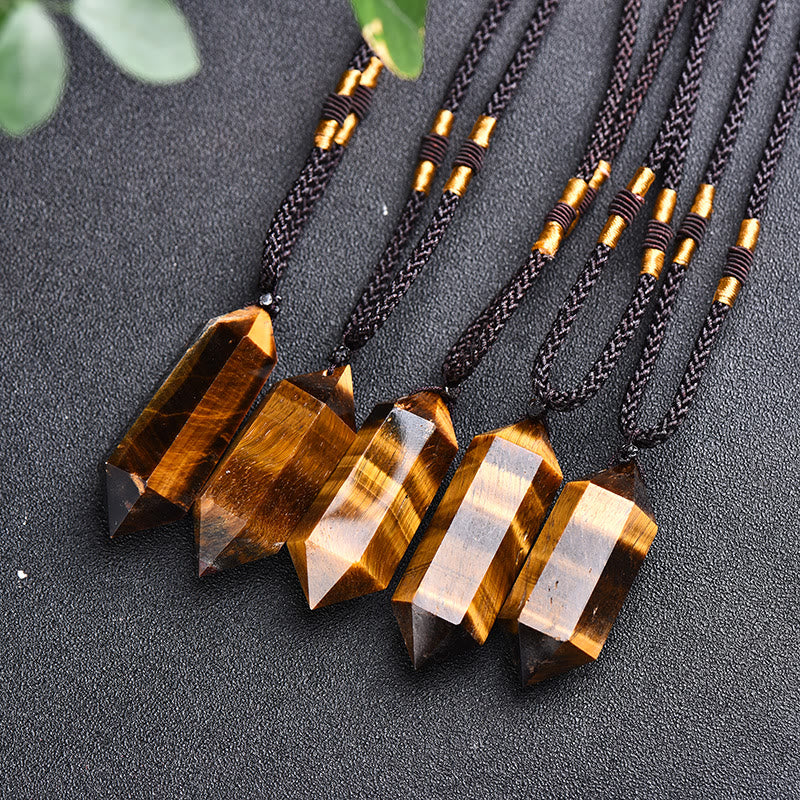 Tigerauge Kristallanhänger auf schwarzer Kette, Schmuck, Heilstein, braun-gold, poliert.