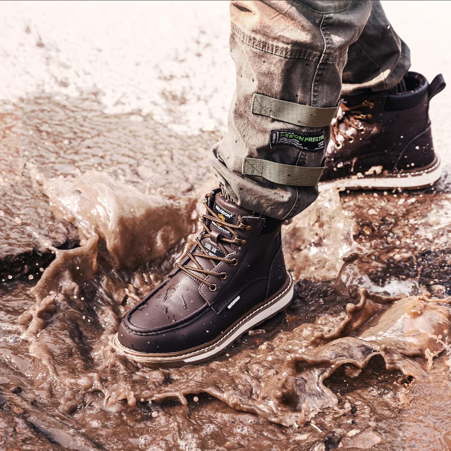 Wasserdichte braune Lederstiefel im Schlamm, Outdoor-Schuhe, robust, rutschfest, Herrenmode.