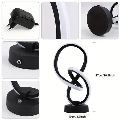 Schwarze LED-Tischlampe, modern, geschwungenes Design, 27 cm hoch, mit Netzteil.