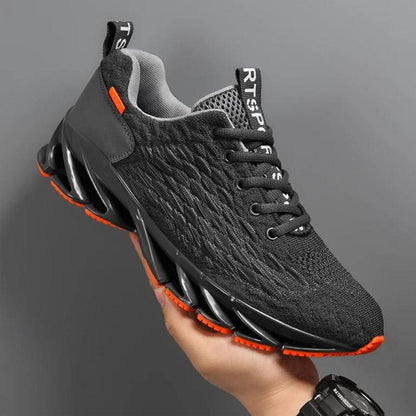 Schwarzer Sportschuh mit orangen Akzenten, atmungsaktives Mesh, rutschfeste Sohle, Herren Sneaker.