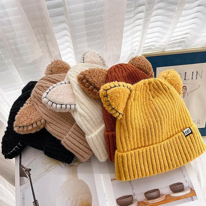 Strickmütze mit Katzenohren, gelb, beige, schwarz, warm, Wintermode, Damenaccessoire.