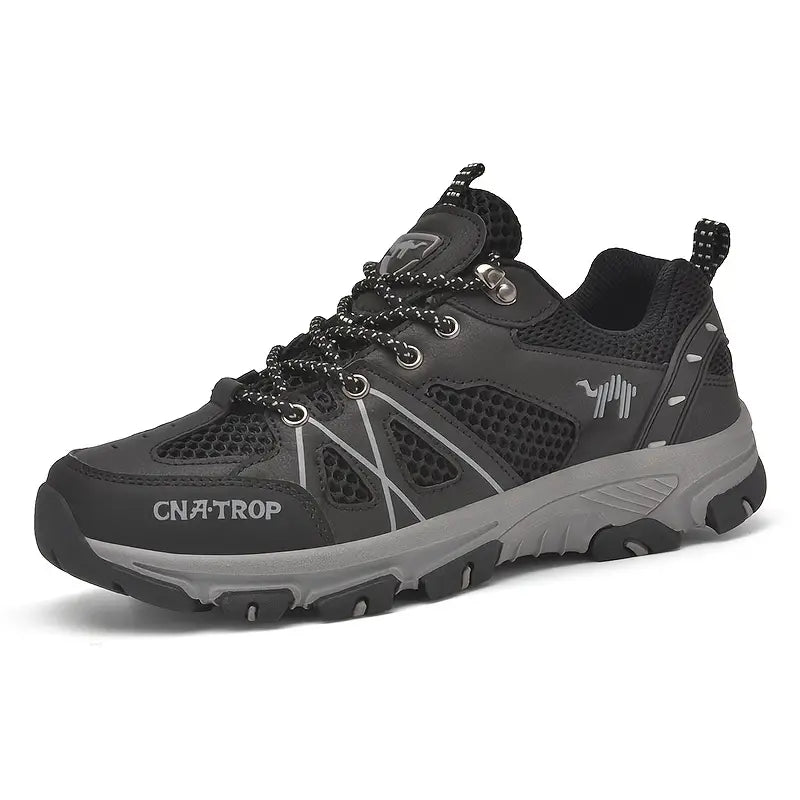 Schwarzer Wanderschuh, atmungsaktiv, rutschfest, robust, für Outdoor-Aktivitäten.