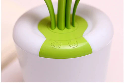 Weiße LED-Lampe mit grünem Touch-Bedienfeld, modernes Design, energiesparend.