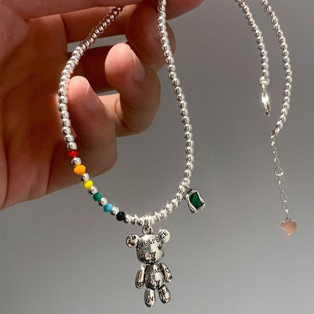 925 Sterling Silber Halskette mit Bärenanhänger und grünem Zirkon für Damen.