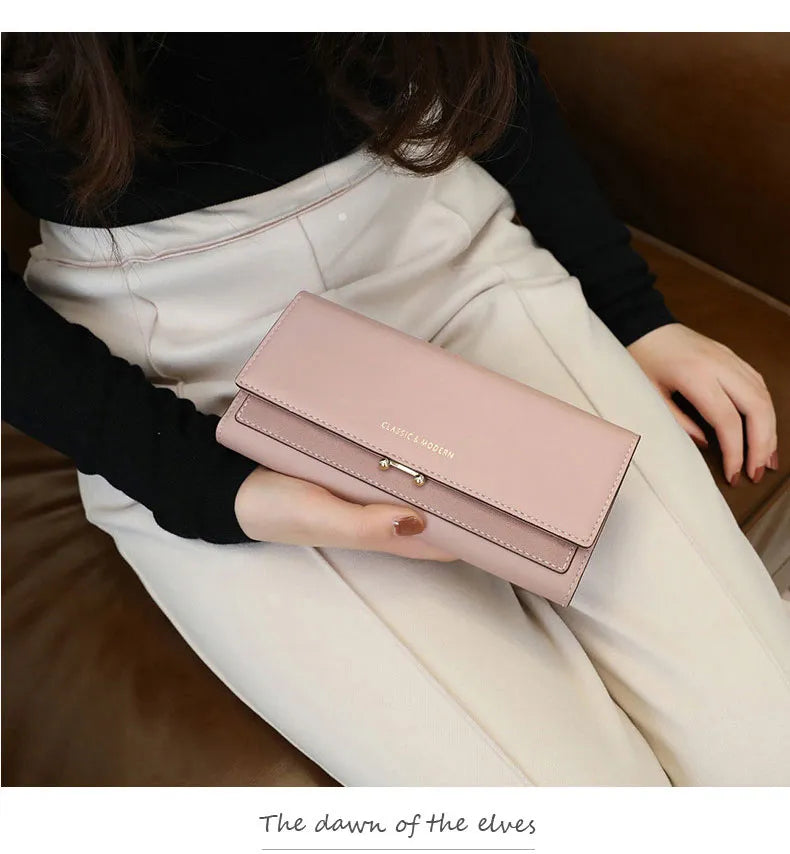Damenhandtasche rosa Leder, elegantes Design, modisches Accessoire, klassischer Stil.