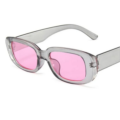 Graue Sonnenbrille mit rosa Gläsern, modisches Accessoire, UV-Schutz, Unisex-Design.