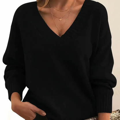 Schwarzer Damenpullover mit V-Ausschnitt, langärmlig, elegantes Design, Herbstmode.