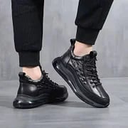 Schwarze Air-Cushion-Sneaker, Herren, Leder, rutschfest, modisch, bequem, für Alltag und Sport.