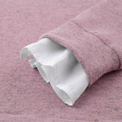 Rosa Strickpullover mit weißem Rüschenärmel, Damenmode, weiches Material, elegantes Design.