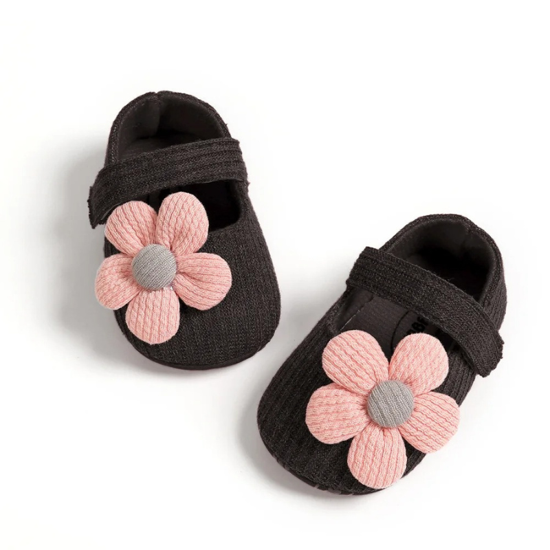 Schwarze Babyschuhe mit rosa Blumen, weiches Material, Klettverschluss, modisch und bequem.