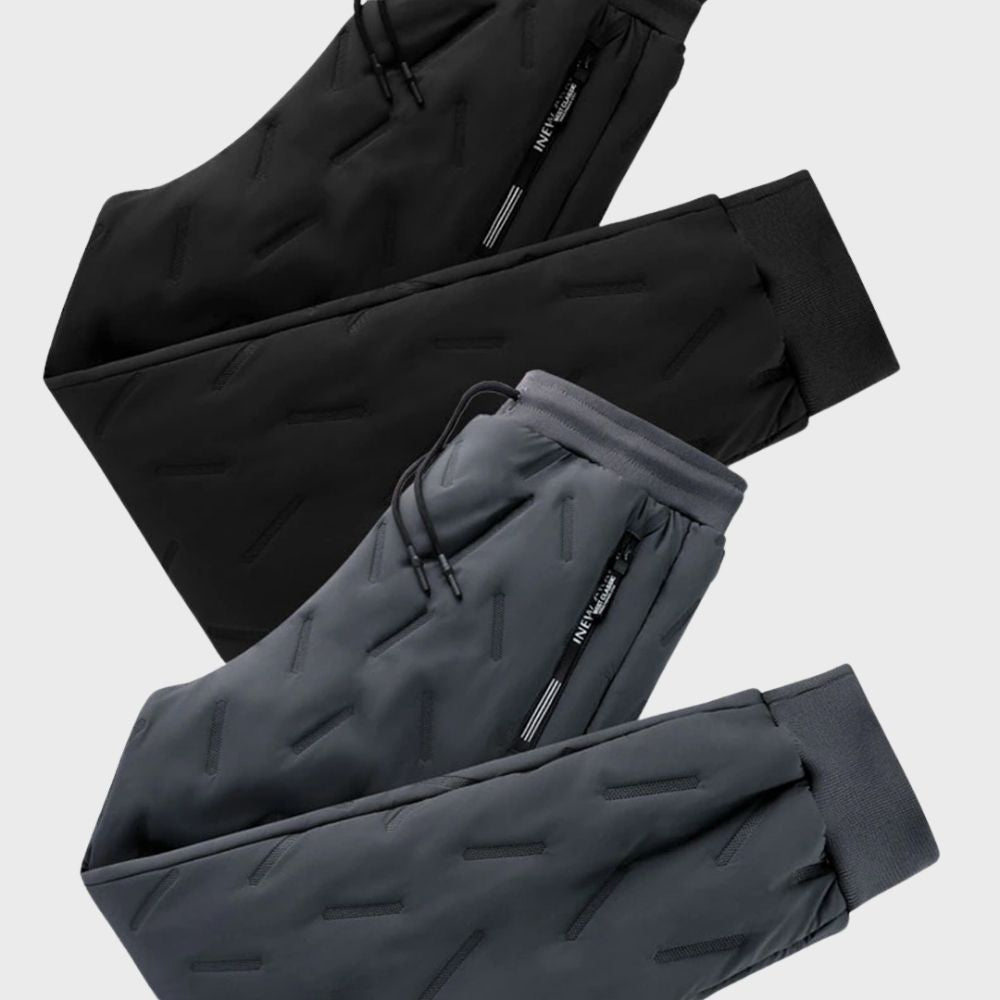 Schwarze und graue Jogginghosen mit Reißverschlusstaschen, sportlich, bequem, Herrenmode.