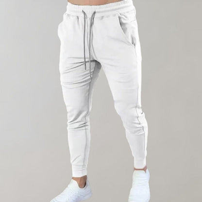 Weiße Jogginghose für Herren, bequem, elastisch, mit Kordelzug, ideal für Sport und Freizeit.