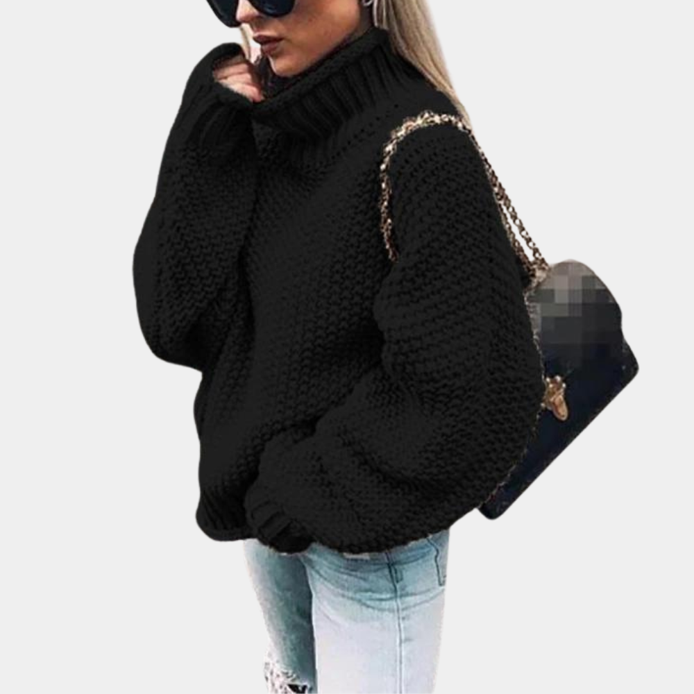 Frau in schwarzem Strickpullover mit Rollkragen, Sonnenbrille und Handtasche, modisch, elegant.