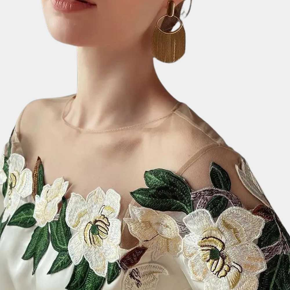 Höstliga blommönster beige damblus med lös passform – Elvira