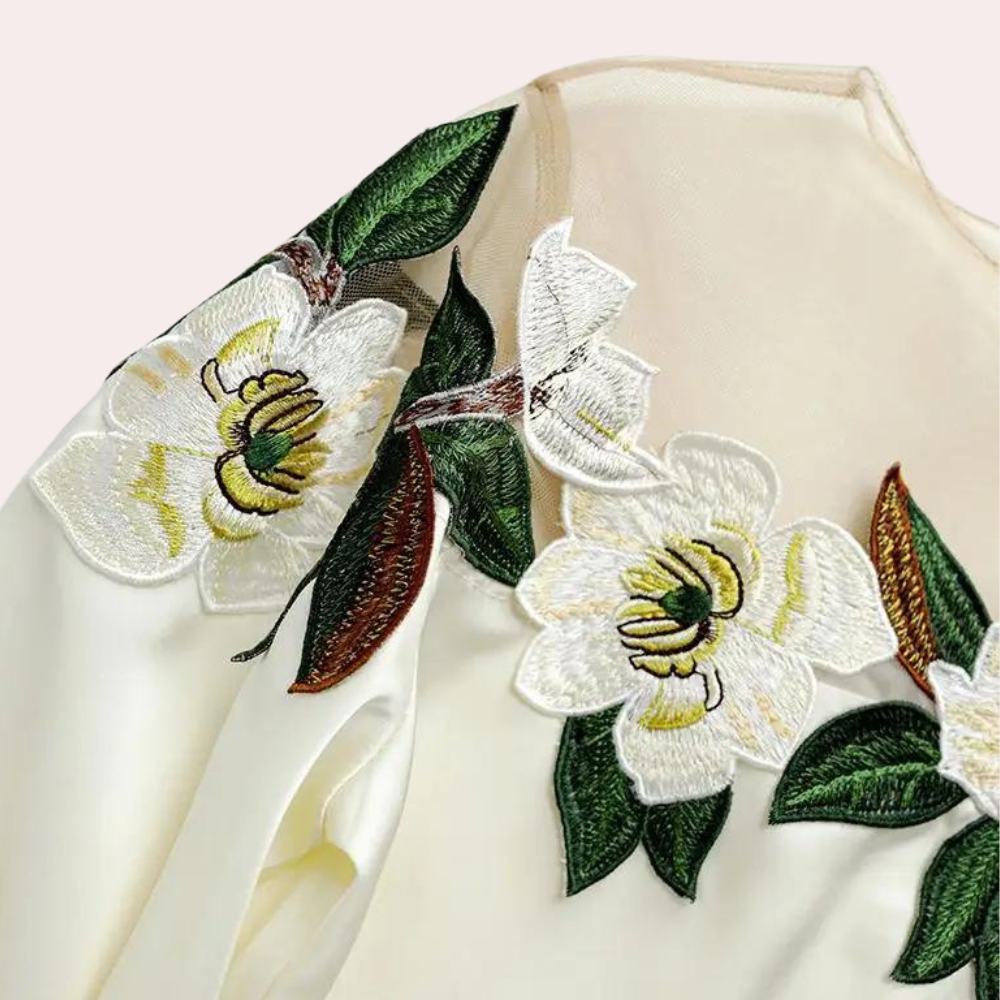Höstliga blommönster beige damblus med lös passform – Elvira