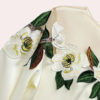 Höstliga blommönster beige damblus med lös passform – Elvira