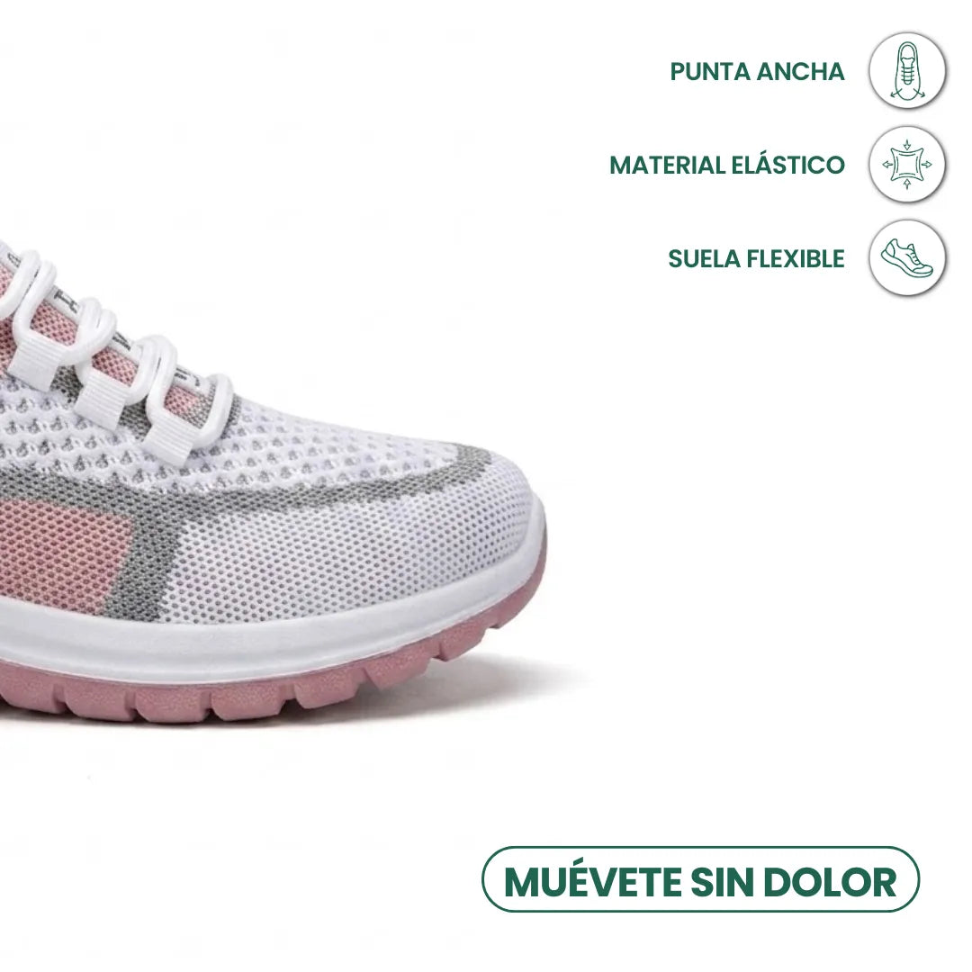 Närbild på den breda tåpartin av den vit-rosa sneakern i elastiskt mesh med böjlig sula. 23