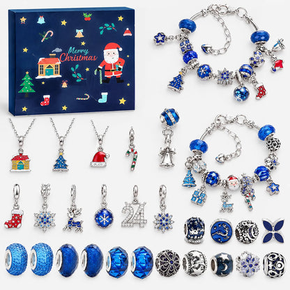 Mörkblå adventskalenderask med tomte och hus samt blå och silverfärgade charms, pärlor, tre halsband och två färdiga jularmband. 11