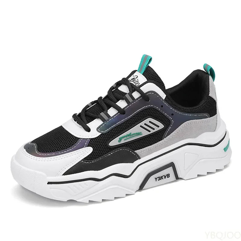 Schwarzer und weißer Sneaker, modisch, atmungsaktiv, mit grünen Akzenten, für Herren.
