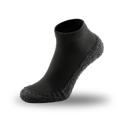 Schwarze rutschfeste Socke, elastisch, mit gepolsterter Sohle, ideal für Sport und Freizeit.