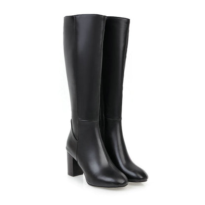 Schwarze Damenstiefel mit Absatz, elegantes Design, hochwertiges Leder, Reißverschluss.