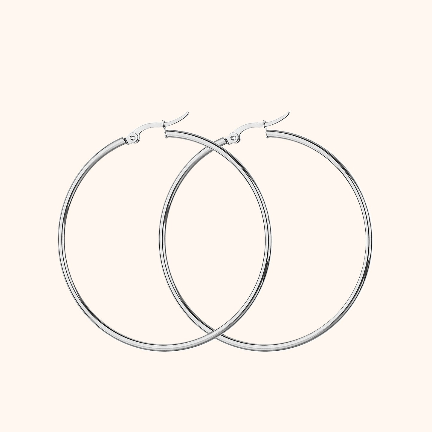 Silberne Creolen Ohrringe, Edelstahl, minimalistisches Design, modischer Schmuck für Damen.