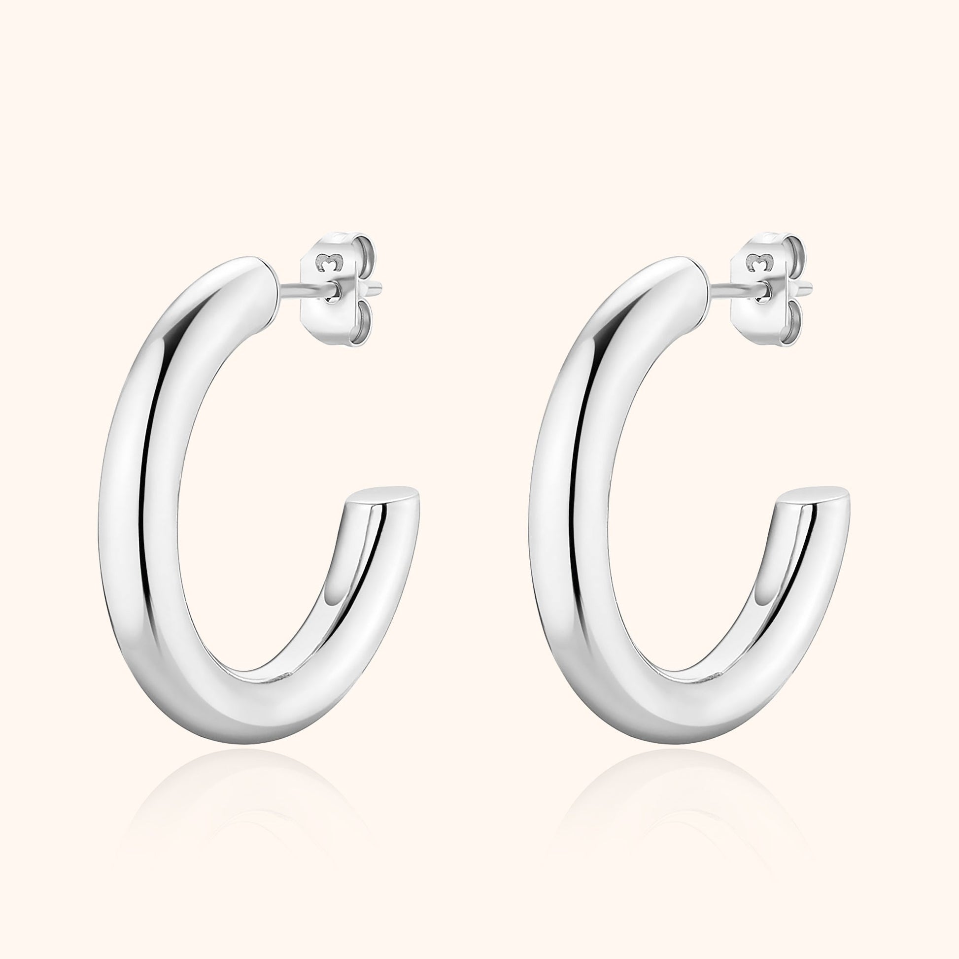 Silberne Creolen Ohrringe, glänzend, Edelstahl, modisch, zeitloses Design, Schmuck für Damen.