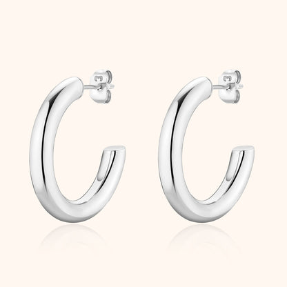 Silberne Creolen Ohrringe, glänzend, Edelstahl, modisch, zeitloses Design, Schmuck für Damen.