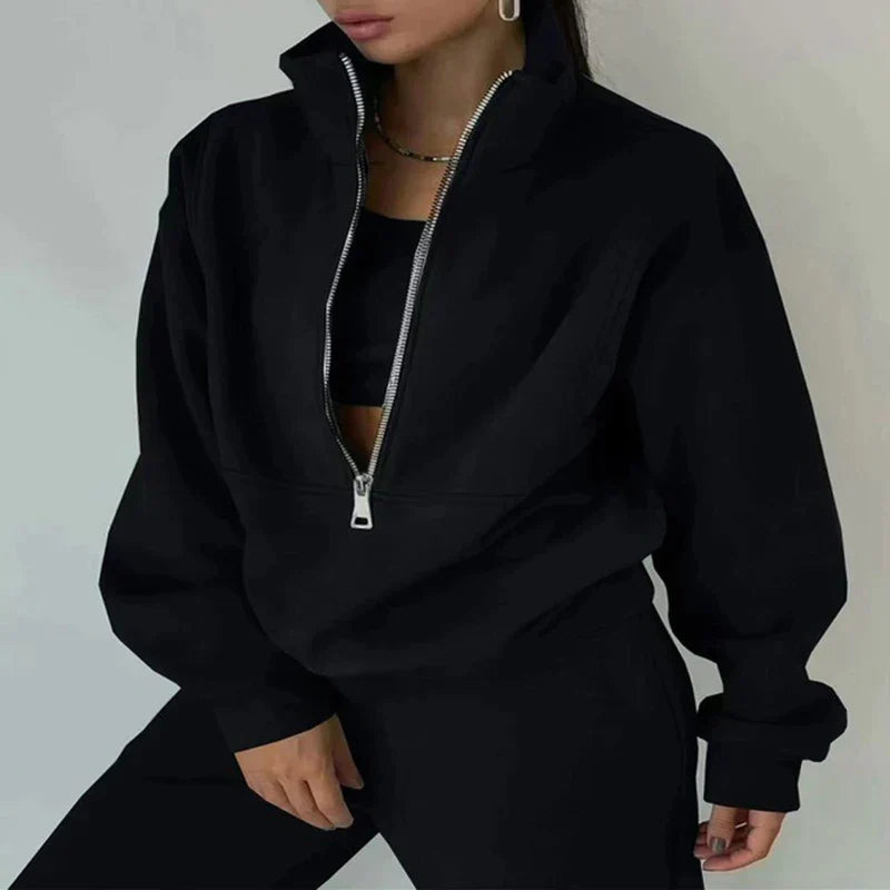 Schwarzer Damen-Hoodie mit Reißverschluss, lässig, modisch, bequeme Freizeitkleidung.