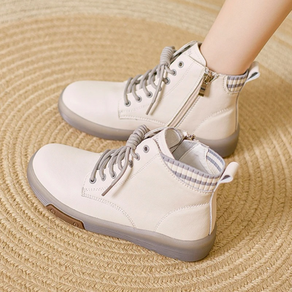 Weiße Damen-Sneaker aus Leder, wasserdicht, hohe Form, mit Reißverschluss und Schnürsenkeln.