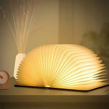 Fällbar boklampa med varmt LED-ljus - StoryGlow