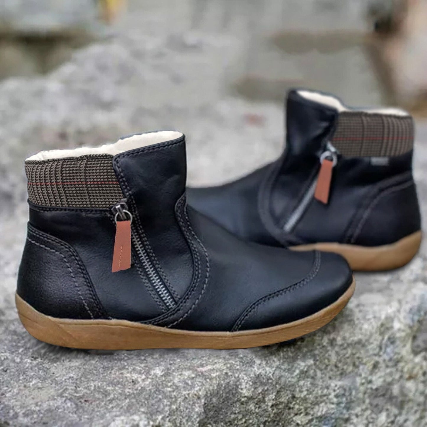 Schwarze Damenstiefeletten mit Reißverschluss, Lederoptik, rutschfeste Sohle, modisch.