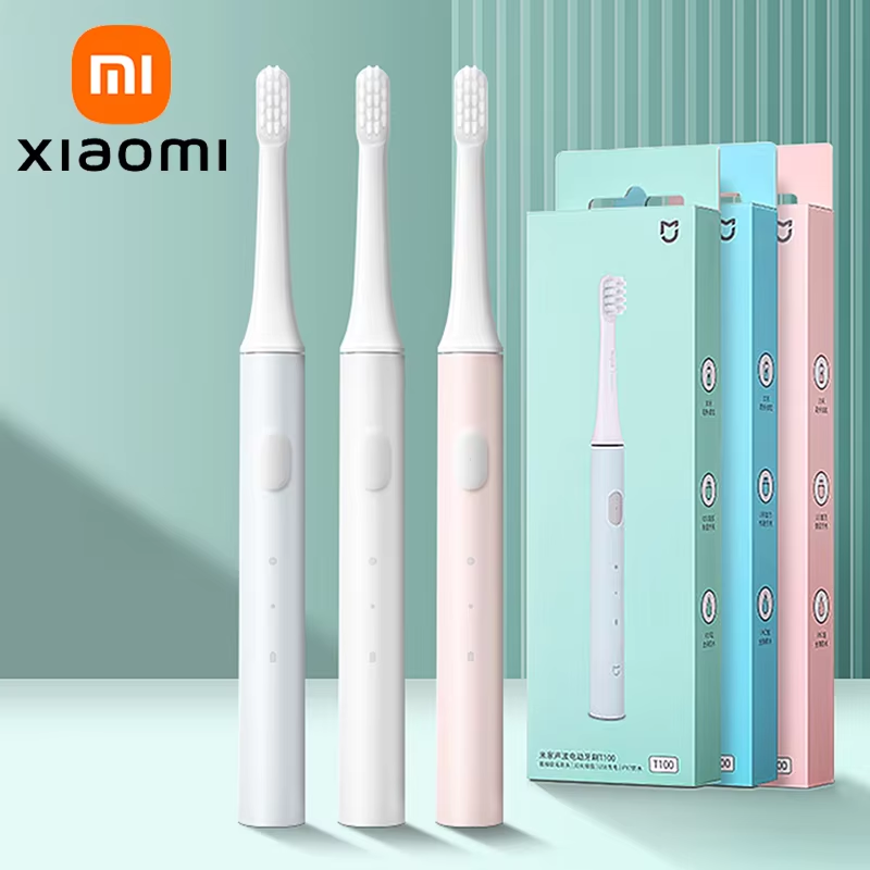 Drei Xiaomi elektrische Zahnbürsten in Weiß und Rosa mit Verpackung, moderne Zahnpflege.