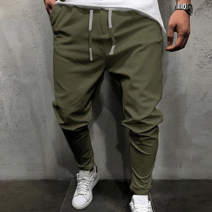 Grüne Jogginghose Herren, Kordelzug, sportlich, bequem, Streetwear, Freizeitmode.