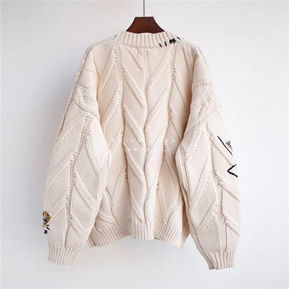 Beiger Strickpullover, Zopfmuster, oversized, Damenmode, Herbst/Winter, gemütlich, warm.