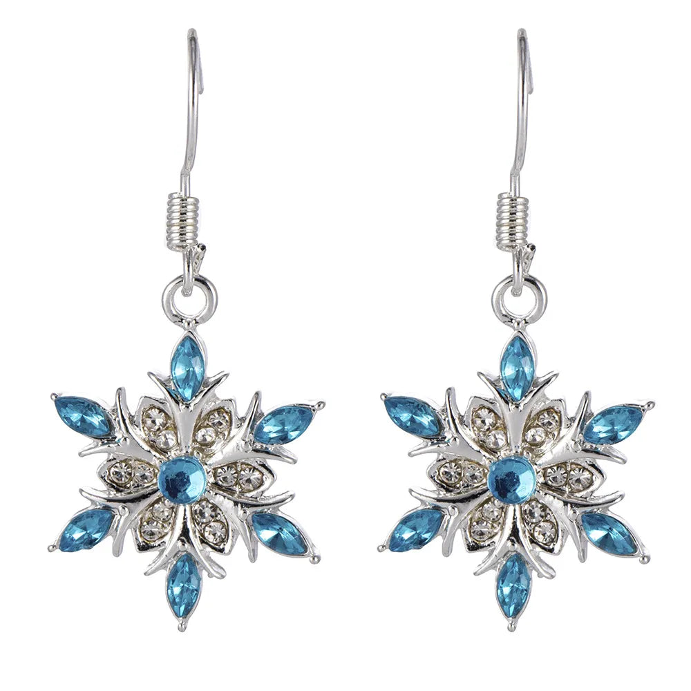Silberne Ohrringe mit blauen Kristallen, Schneeflocken-Design, eleganter Schmuck für Damen.