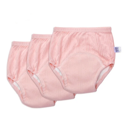 Drei rosa Baby-Trainingshosen aus Baumwolle, atmungsaktiv, waschbar, umweltfreundlich.