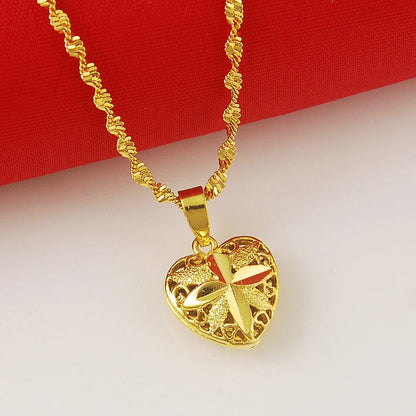 Goldene Herz-Halskette mit filigranem Design, Damen-Schmuck, modisch, Geschenkidee.