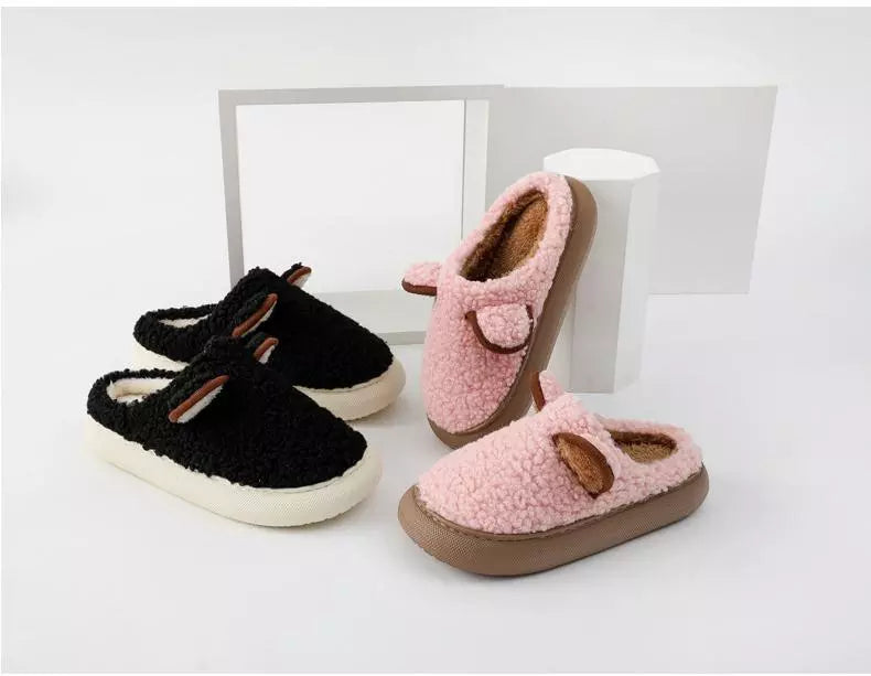 Schwarze und rosa Plüsch-Hausschuhe, rutschfest, warm, für Damen und Herren.