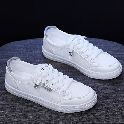 Weiße Sneaker aus Canvas, Unisex, modisch, lässig, rutschfest, ideal für Alltag und Freizeit.
