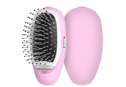 Rosa elektrische Haarbürste, kabellos, mit Borsten, für glattes Haarstyling und Entwirrung.