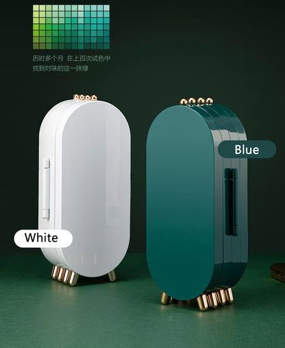 Weiße und blaue Mini-Kühlschränke, oval, modern, tragbar, für Kosmetikaufbewahrung.
