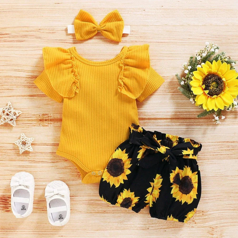 2-delad babyoutfit med solrosmönster – SolLeende