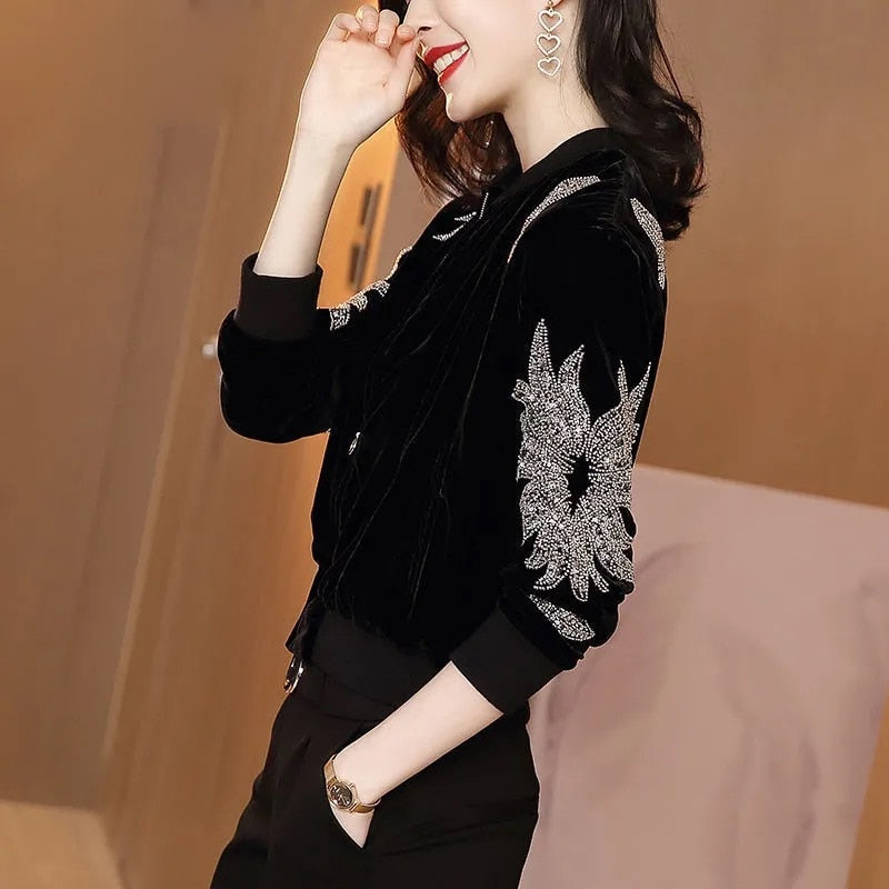 Damenjacke schwarz Samt mit silbernen Pailletten, elegantes Design, modische Oberbekleidung.