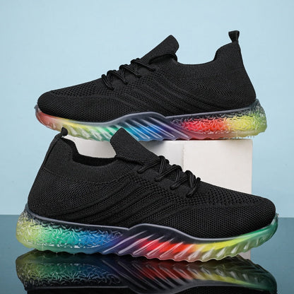 Schwarze Sneaker mit Regenbogen-Sohle, atmungsaktives Mesh, modische Sportschuhe.